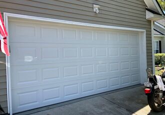 Garage door after the panel replacement