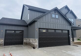 Front of the new home and garage in Erie