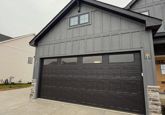 Double garage door with window row