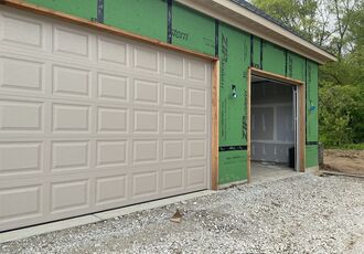 Double almond garage door on a new garage in Thornton